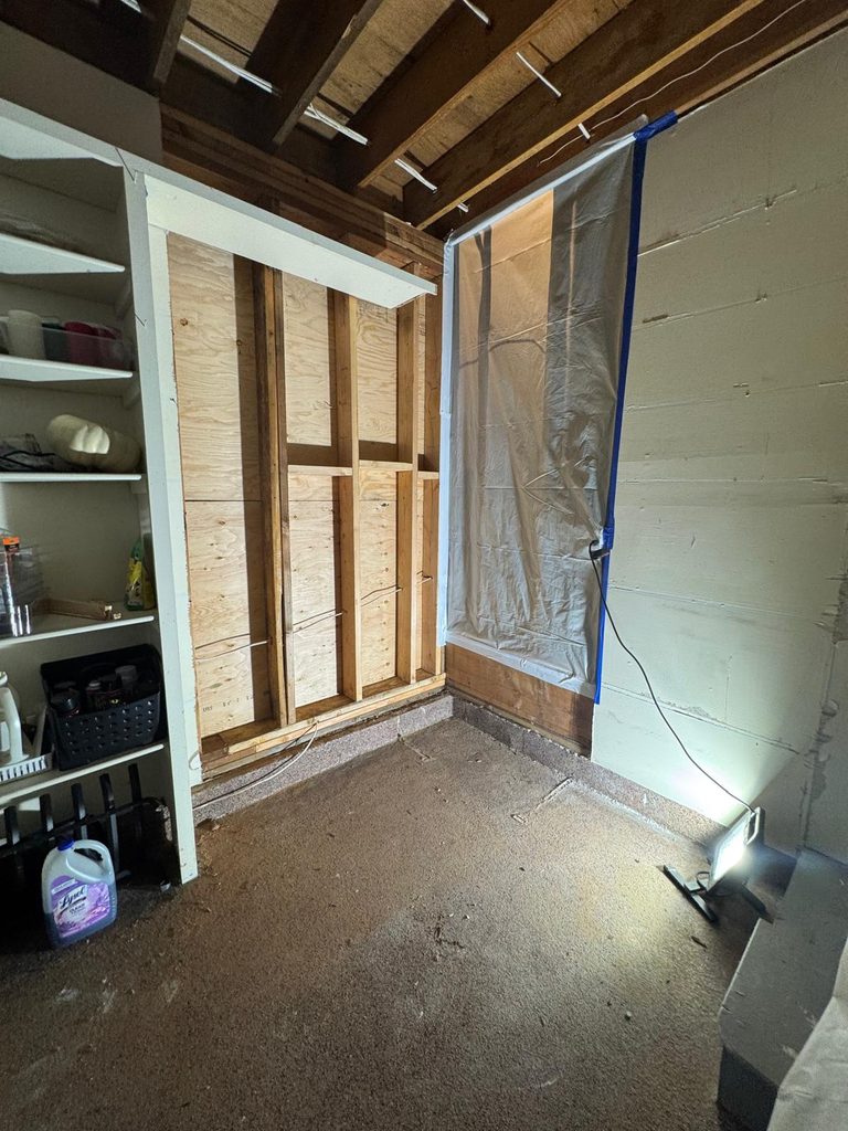 containment after the garage mold and water services performed. Post demolition.